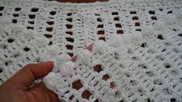 adding the bubble crochet stitch at the edge of the rectangle.
